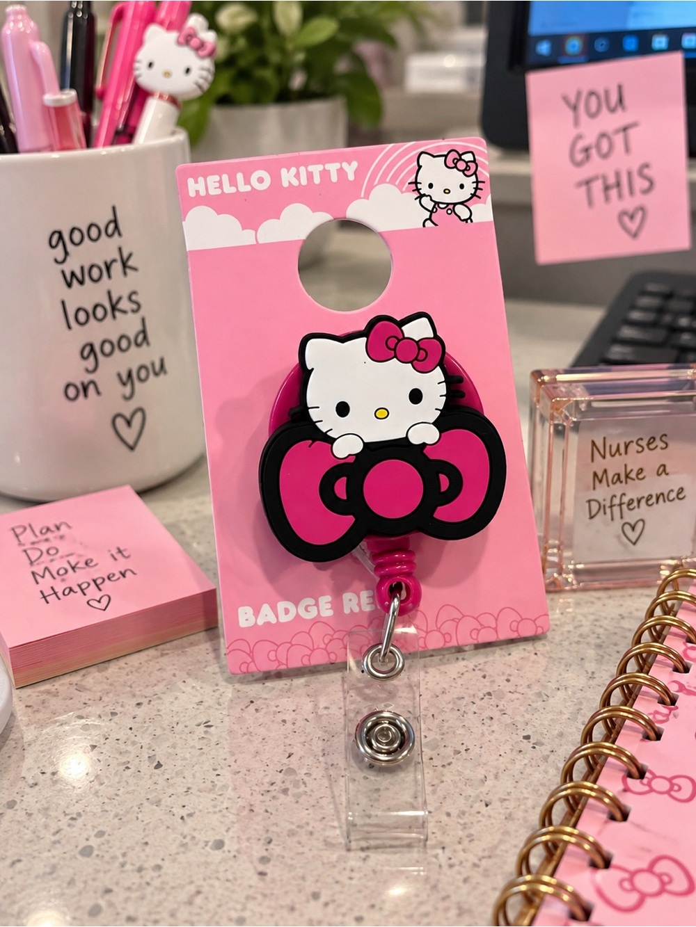 Hello Kitty Pink and Black Badge Reel with Bow Design